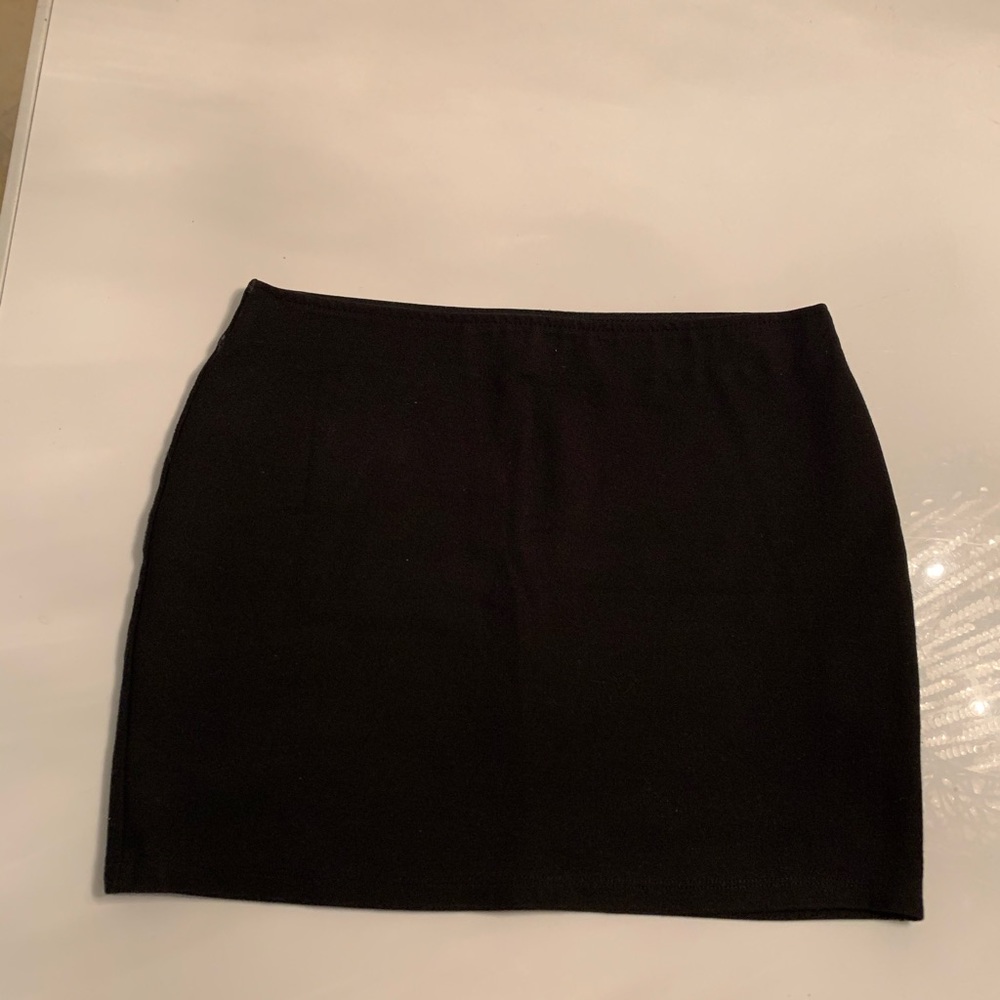 Short black stretchy skirt from Bershka